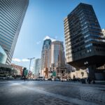 Boston Accountant Roles for Foreigners, $72,000 Annual Salary with H1-B Visa Support A vibrant view of Boston's downtown area showing iconic skyscrapers against a clear blue sky.